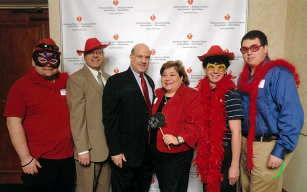 The Go Red for Women Luncheon at Quaker Station in Akron, Ohio offered attendees the opportunity to wear exciting costumes - all in red. Attending this year's event were [left to right] Zack Koozer, Joe May, John Chames, Elizabeth Z. Bartz, David Jones, and Nikos Frazier.